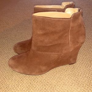 Brown heeled boots.